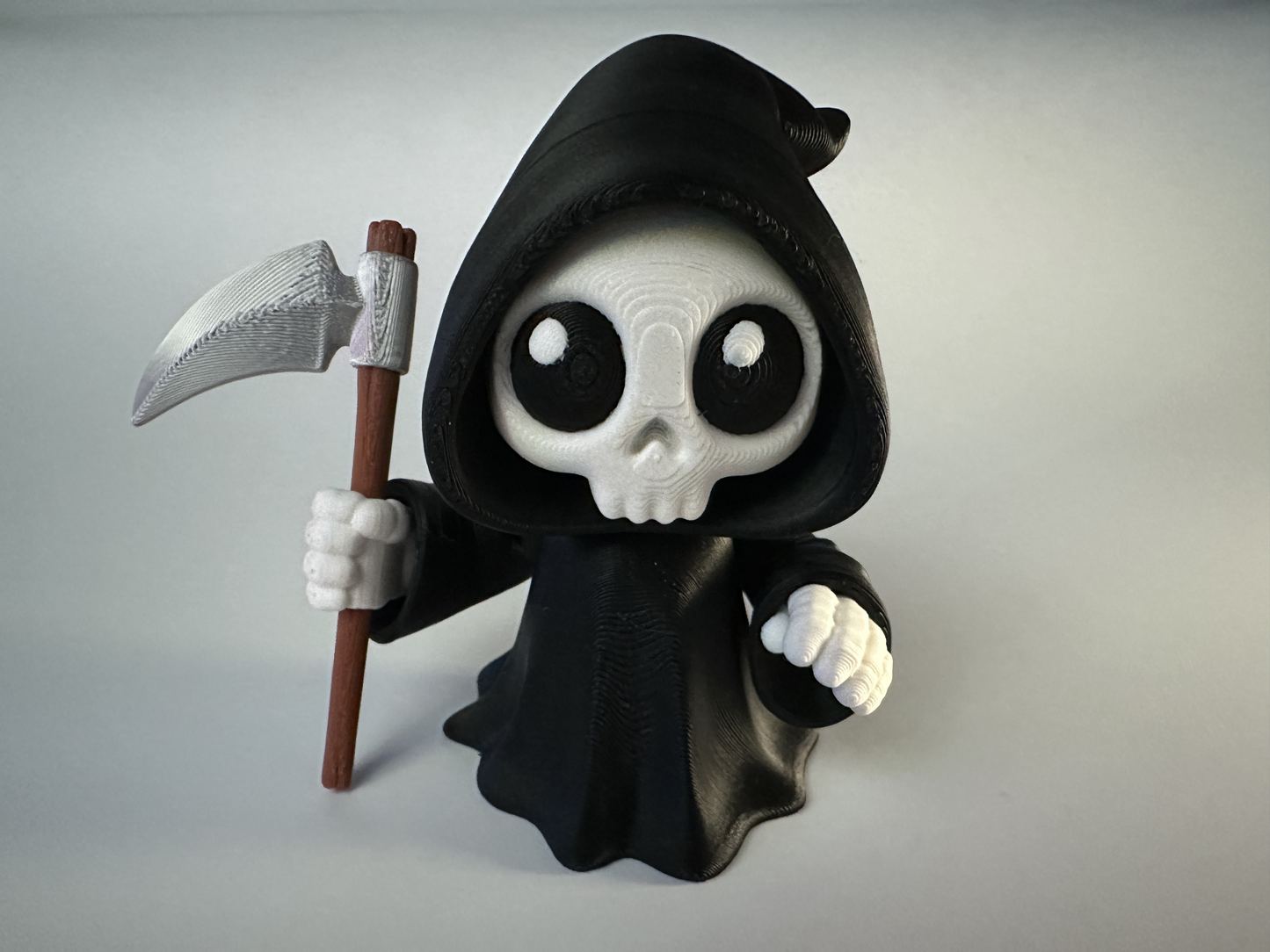 Chibi Grim Reaper Figure 💀 – Cute and Creepy Desk Companion!